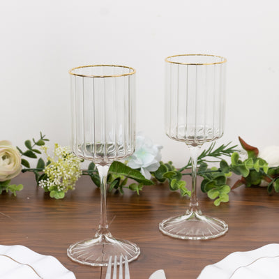 Elegant glassware set with gold rim, perfect for celebrations.