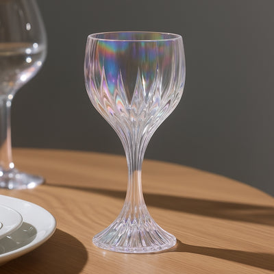 Elegant crystal wine glass with a unique design and iridescent finish.