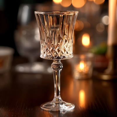 Elegant crystal glass with intricate design and stem