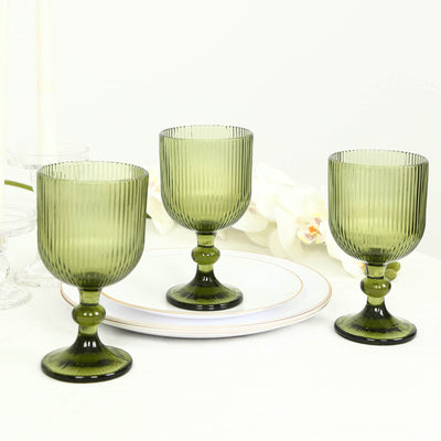 Green ribbed glass goblet set with vintage stemware design
