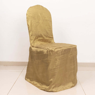 Gold chair cover on a plain backdrop