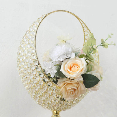 Elegant floral arrangement in a crystal vase with gold accents.