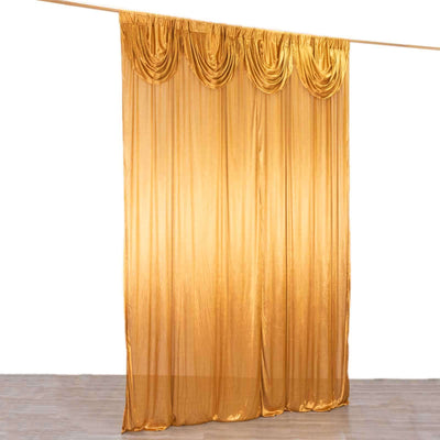 Gold sheer curtain with elegant draping for home decor