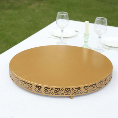 Gold decorative serving tray with intricate design.