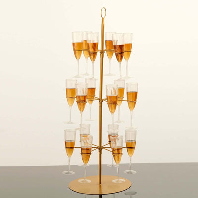 Champagne tower with elegant glasses filled with sparkling drink