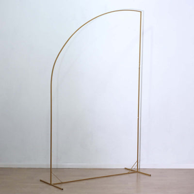 Gold curved backdrop stand on a plain background.