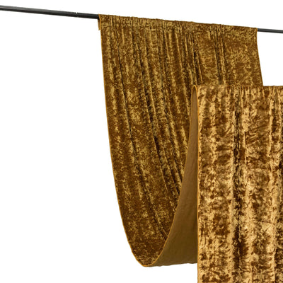 Gold velvet curtain draped elegantly on a rod.
