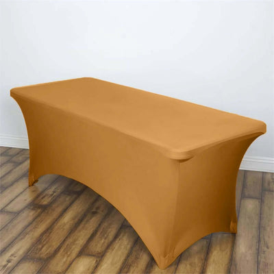 Brown fitted table cover on a wooden floor.