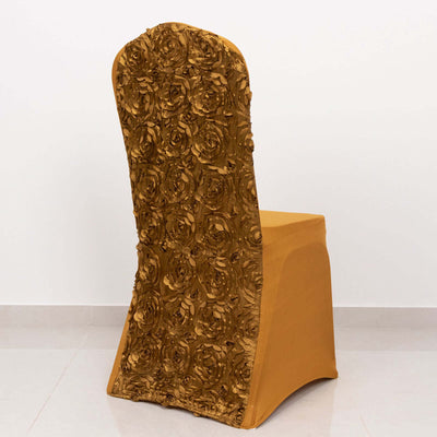Decorative gold chair cover with rose design on a plain backdrop.