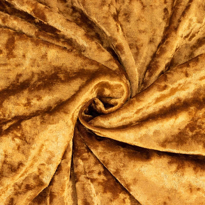 Luxurious golden velvet fabric swirl texture