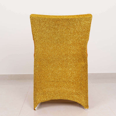 Gold glitter chair against a plain backdrop.