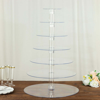 Clear acrylic cupcake stand with six tiers for displaying desserts.