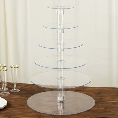 Acrylic tiered display stand with five circular shelves.