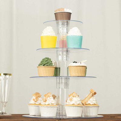 Colorful cupcake display stand with assorted cupcakes arranged in tiers.