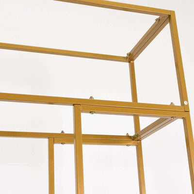 Gold metal shelving unit with open design and sturdy frame.