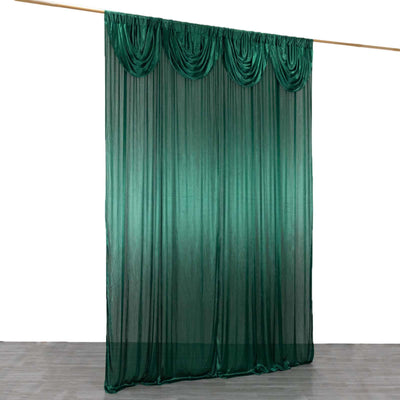 Green drapery curtain with gathered top, ideal for stage or decorative use.