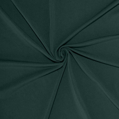 Dark green fabric with a smooth texture and draped design.
