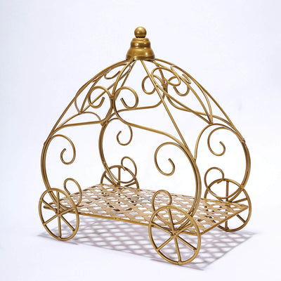 Gold decorative cart with intricate scrollwork design.