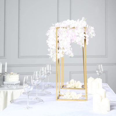 Elegant floral centerpiece in a gold frame for dining tables.