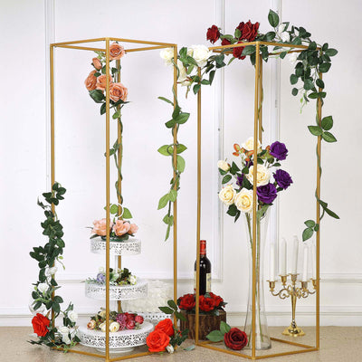 Decorative floral display with gold frames and assorted roses.