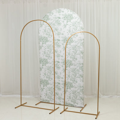 Gold metal photo backdrop stands with floral design screen.