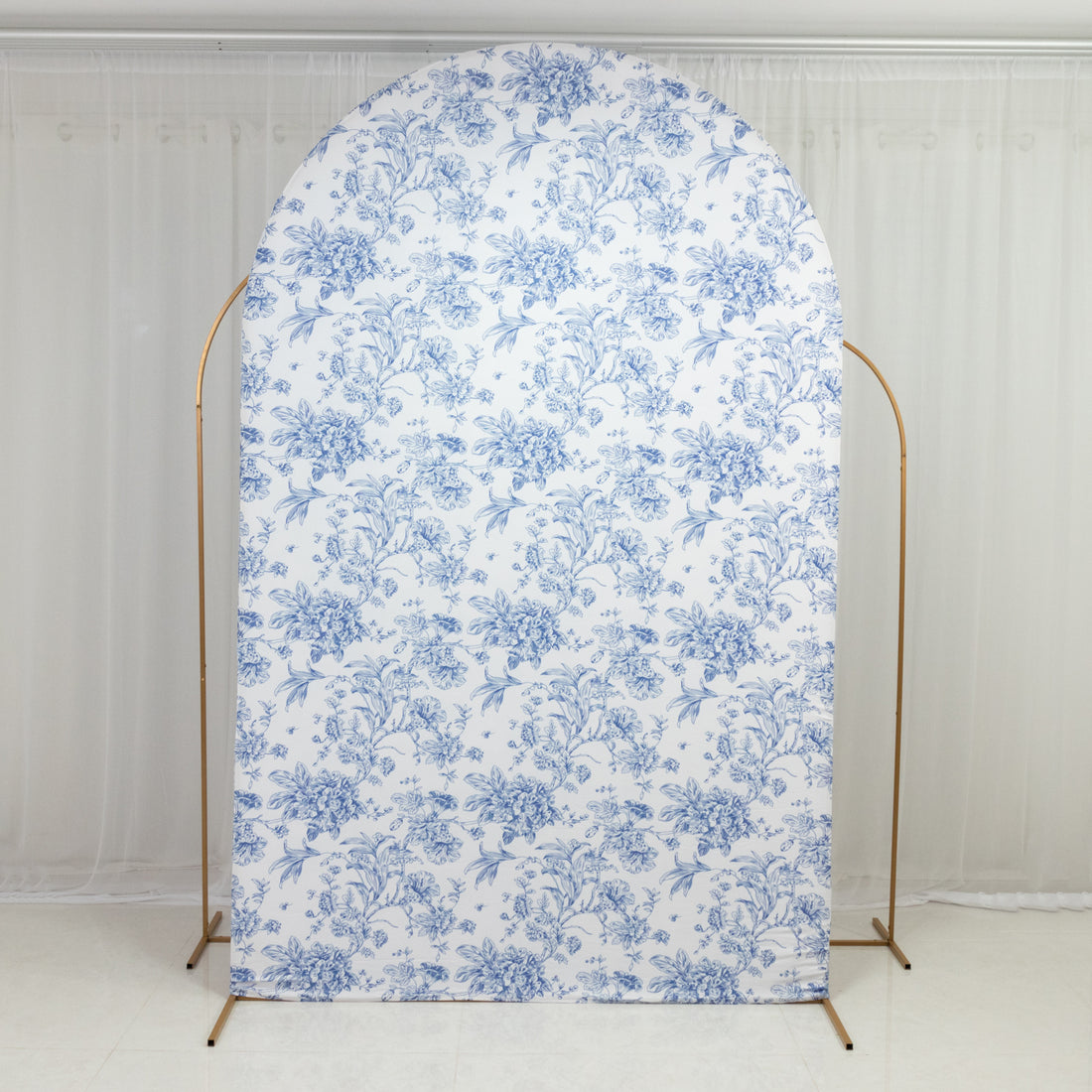 Floral backdrop with arched design and gold frame for photography.