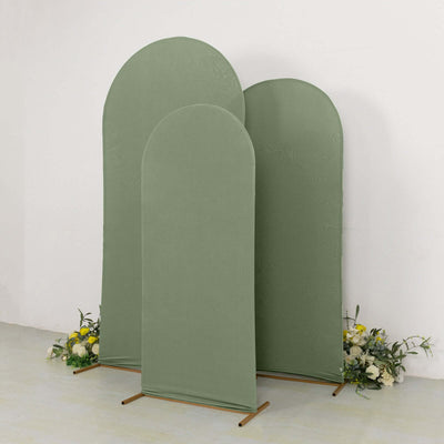 Green fabric backdrops in various heights, set against a plain background.