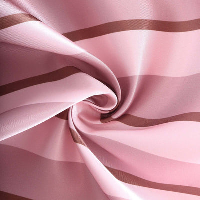 Pink and brown striped fabric in a swirling pattern.