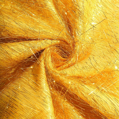 Shimmering gold fabric with sparkling threads and intricate textures.