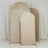 Three textured fabric backdrops in beige tones, varying in height and shape.