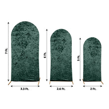 Three different sizes of crushed velvet arch covers in hunter emerald green color