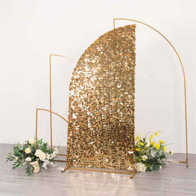 Gold sequin backdrop with curved design and floral arrangements.