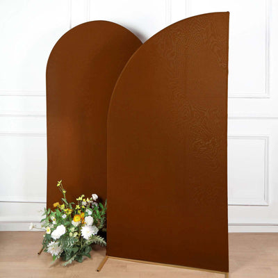 Brown curved display stands with floral arrangement in front.