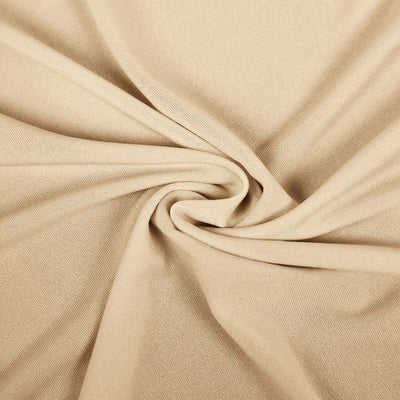 Beige fabric texture with soft folds and drapes.