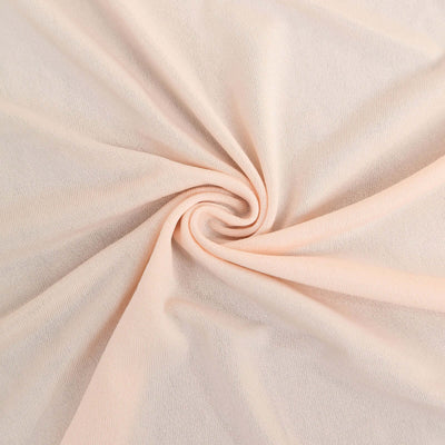 Light peach fabric with a soft, smooth texture.