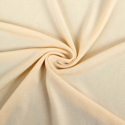 Light peach fabric texture swirled in a circular pattern.