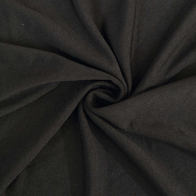 Black fabric textile with a smooth, swirling texture.