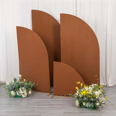 Brown curved backdrop panels with floral arrangements in front.