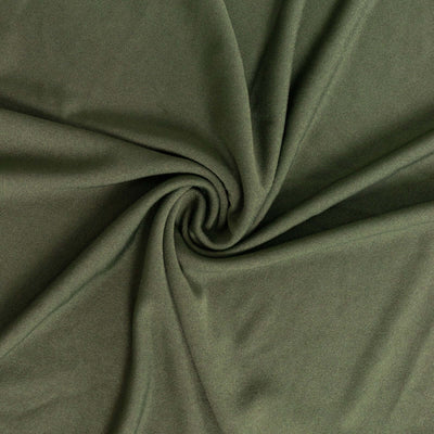 Olive green fabric texture with soft draping folds.
