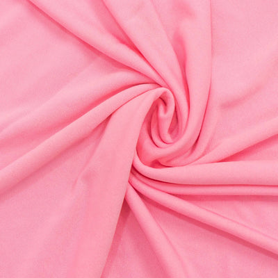 Soft pink fabric with smooth texture and drape.