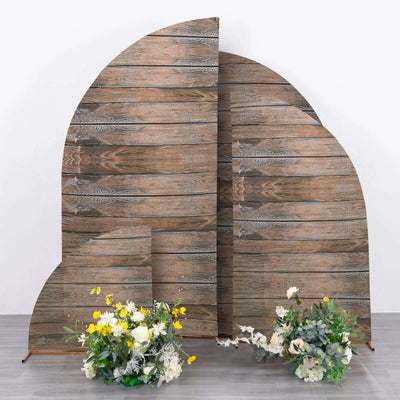 Wooden backdrop with floral arrangements in front, styled for photography.