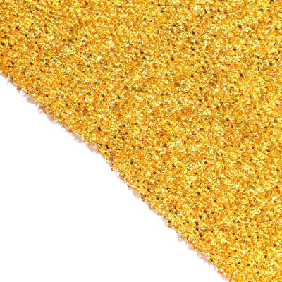Golden decorative mesh fabric with shimmering texture.