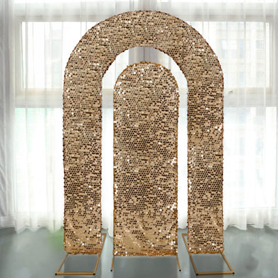 Sequin-covered decorative archway set against a bright window backdrop.
