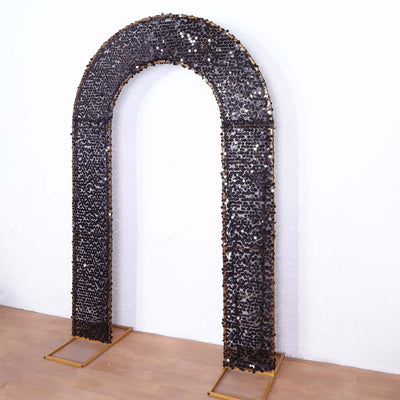 Decorative black and gold archway display