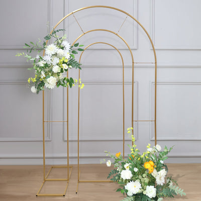 Gold flower arch with floral arrangements, perfect for weddings and events.