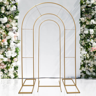 Gold metal arch backdrop for events and photography.