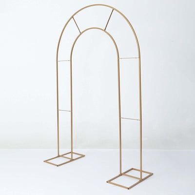 Gold metal arch stand for events or decor display