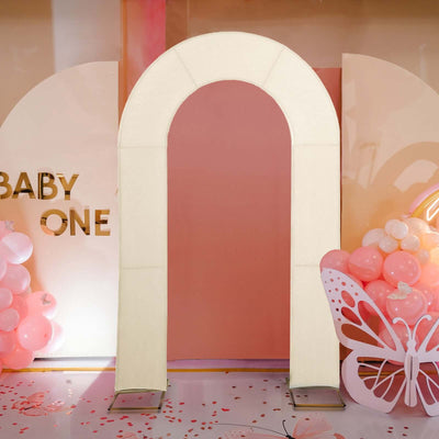 Decorative arch for baby shower events with pastel balloons and butterfly decor.