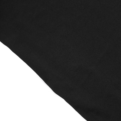 Black fabric texture on a white background.