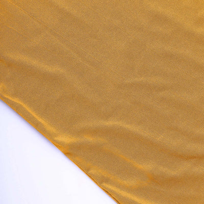 Golden fabric texture on a white background